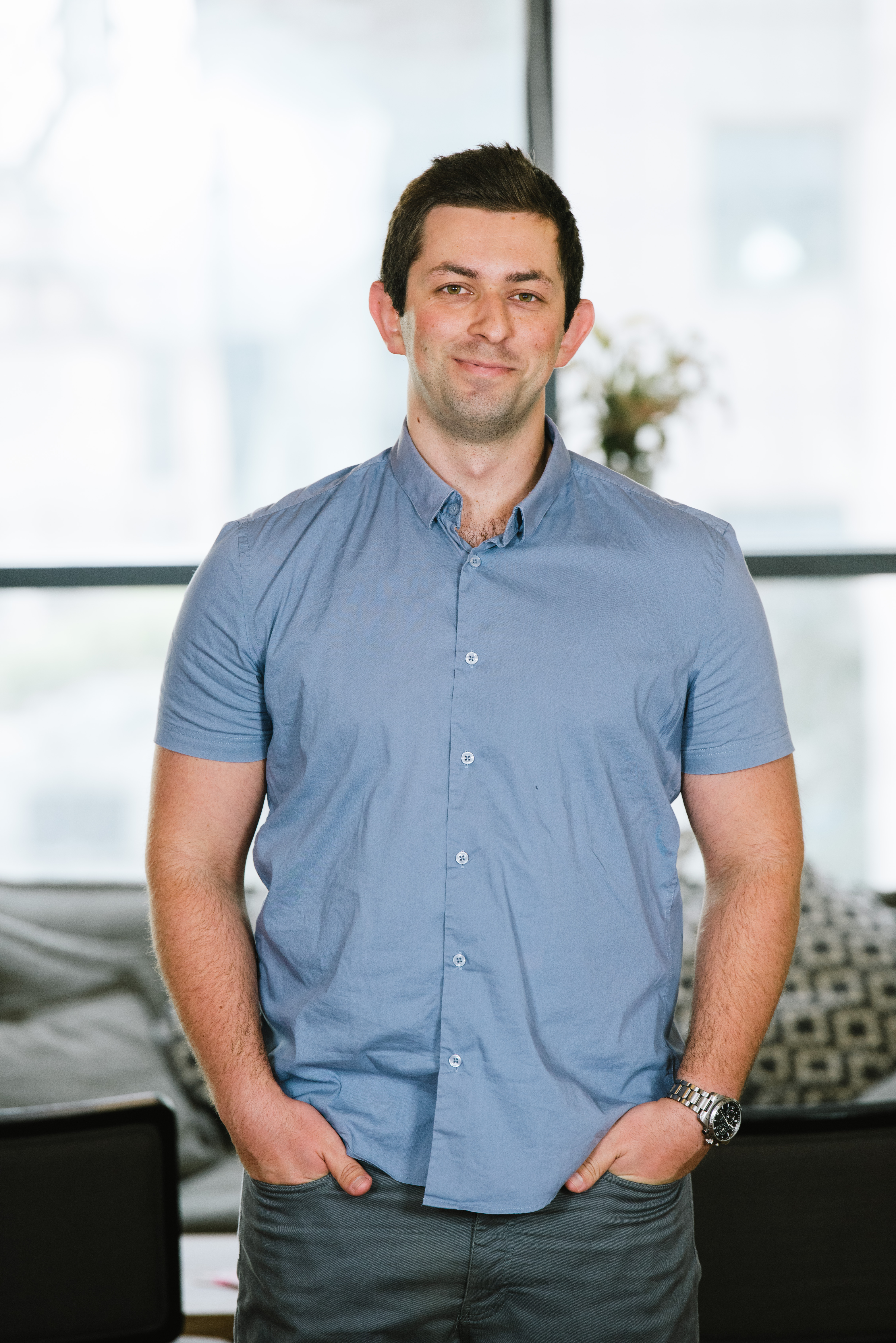 Gal Dubinski standing in a blue shirt
